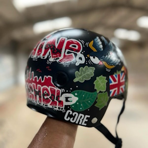 Hand painted helmet with BMX rider Kaine Mitchell based on nature themes and birds.